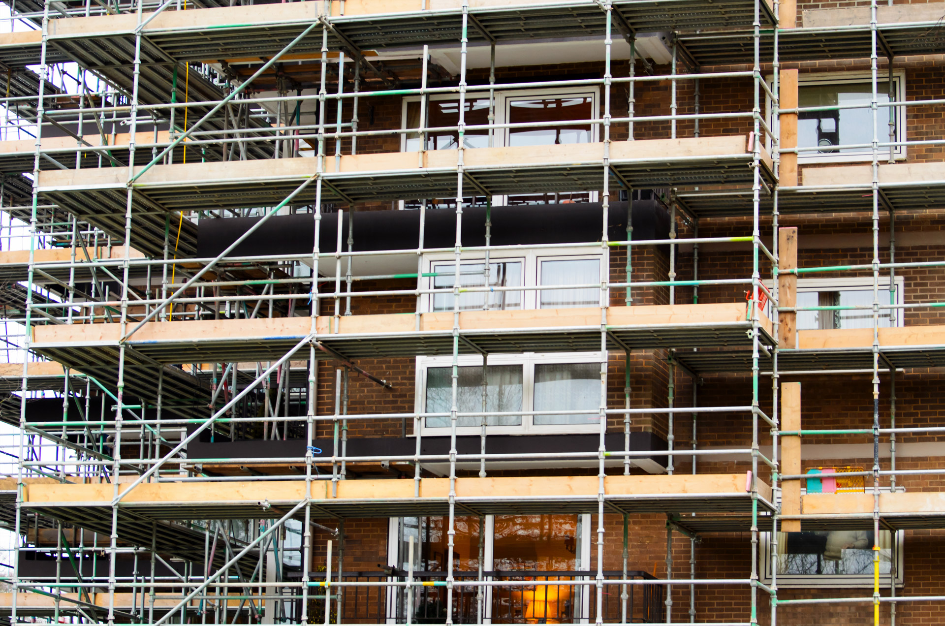 What methods can increase the stability of industrial scaffolding